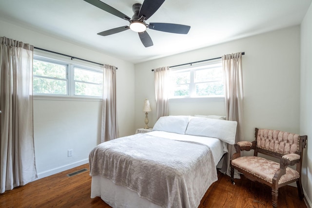 3707 Norma Dr, Chattanooga, TN 37412 - bedroom featuring multiple windows, wood finished floors, and a ceiling fan
