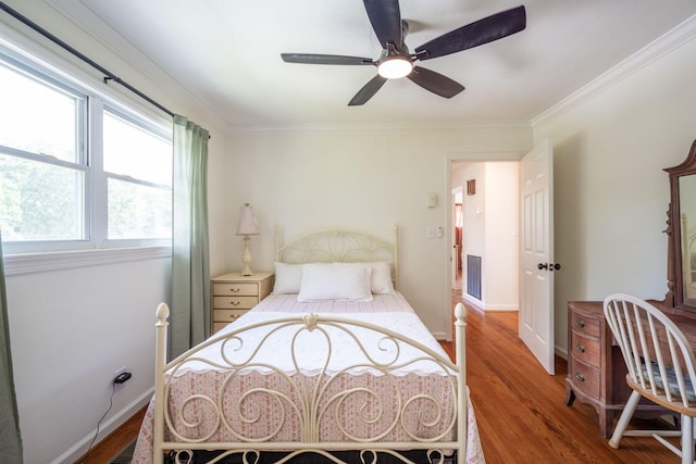 3707 Norma Dr, Chattanooga, TN 37412 - bedroom featuring wood finished floors, crown molding, and ceiling fan