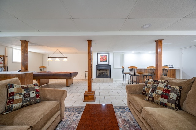 3707 Norma Dr, Chattanooga, TN 37412 - living room with tile patterned flooring, a paneled ceiling, billiards, and a tiled fireplace