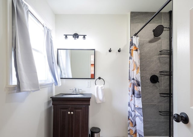3707 Norma Dr, Chattanooga, TN 37412 - full bath featuring plenty of natural light, tiled shower, and vanity