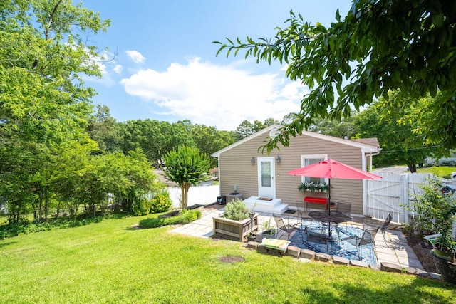 3707 Norma Dr, Chattanooga, TN 37412 - fenced backyard featuring a patio