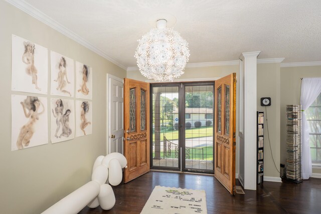 100 Pine Cone Ln, Chattanooga, TN 37415 - foyer with a chandelier, dark wood-style floors, crown molding, and french doors