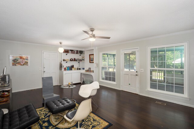 100 Pine Cone Ln, Chattanooga, TN 37415 - living area with crown molding, dark wood finished floors, and a ceiling fan