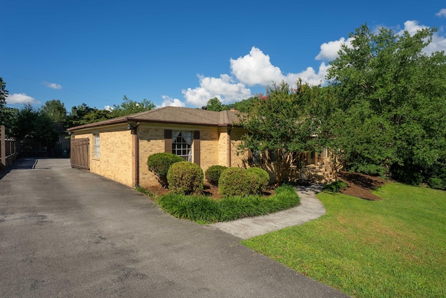 100 Pine Cone Ln, Chattanooga, TN 37415 - view of front facade featuring a front lawn and brick siding
