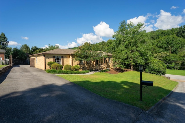 100 Pine Cone Ln, Chattanooga, TN 37415 - view of front of house with a front lawn and brick siding