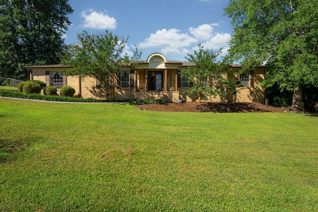 100 Pine Cone Ln, Chattanooga, TN 37415 - ranch-style house featuring a front yard and brick siding