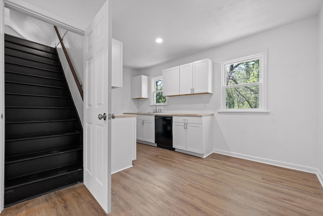 3002 Peggy Ln, Chattanooga, TN 37404 - kitchen featuring dishwasher, white cabinets, light wood-style flooring, light countertops, and recessed lighting