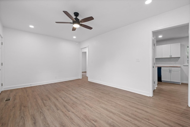 3002 Peggy Ln, Chattanooga, TN 37404 - unfurnished living room with ceiling fan, light wood-style floors, and recessed lighting
