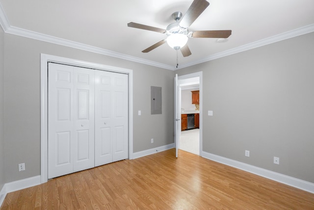 3609 Brass Lantern Way, Chattanooga, TN 37415 - unfurnished bedroom with crown molding, light wood-style flooring, a closet, electric panel, and a ceiling fan
