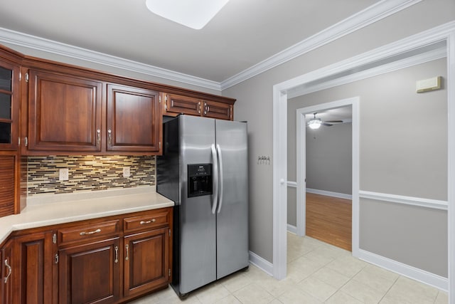 3609 Brass Lantern Way, Chattanooga, TN 37415 - kitchen featuring stainless steel fridge, light countertops, tasteful backsplash, glass insert cabinets, and crown molding