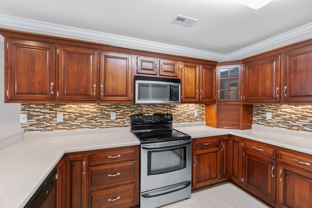 3609 Brass Lantern Way, Chattanooga, TN 37415 - kitchen featuring stainless steel appliances, light countertops, light tile patterned floors, tasteful backsplash, and glass insert cabinets