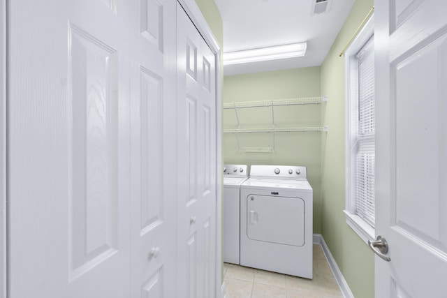 3609 Brass Lantern Way, Chattanooga, TN 37415 - laundry room with light tile patterned flooring and separate washer and dryer