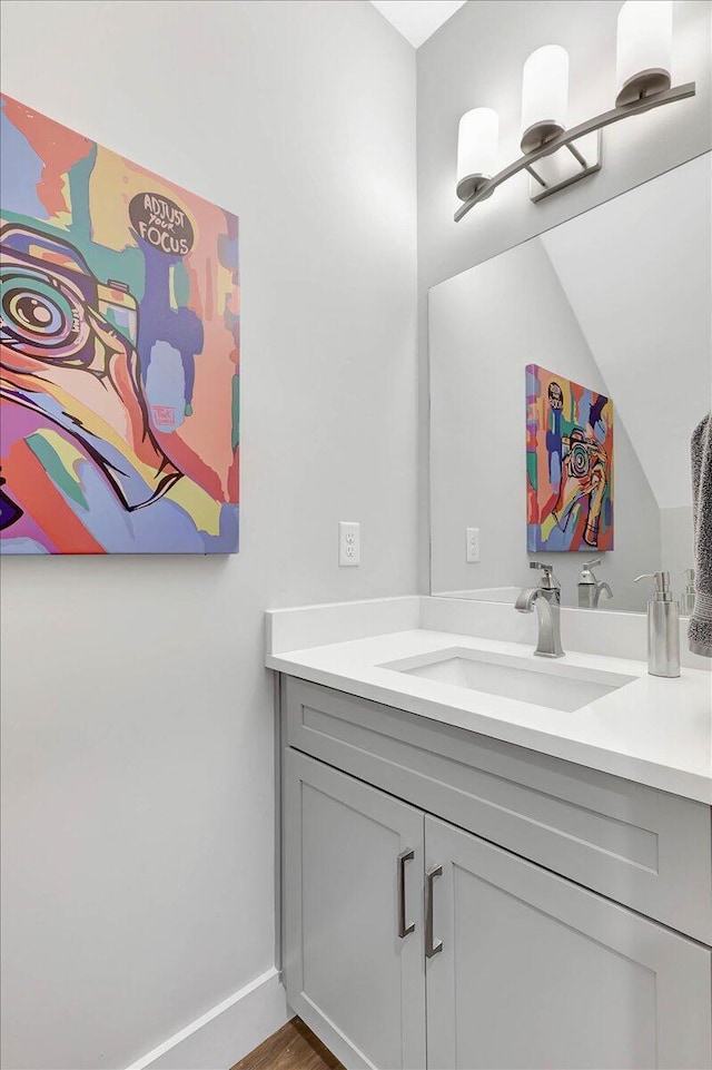 280 W 16th St, Chattanooga, TN 37408 - bathroom featuring vanity, vaulted ceiling, and wood finished floors