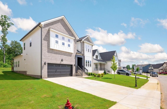 8340 Snowdrop Way, Ooltewah, TN 37363 - view of front of property featuring an attached garage, concrete driveway, brick siding, a front lawn, and a residential view