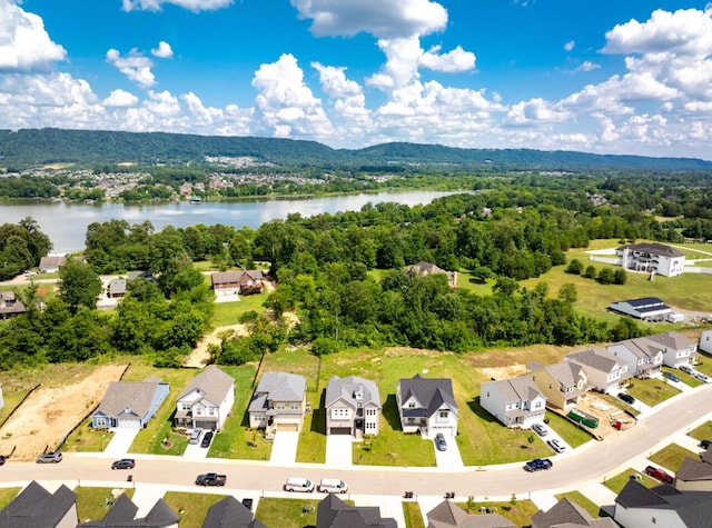 8340 Snowdrop Way, Ooltewah, TN 37363 - aerial perspective of suburban area with a large body of water and a forest