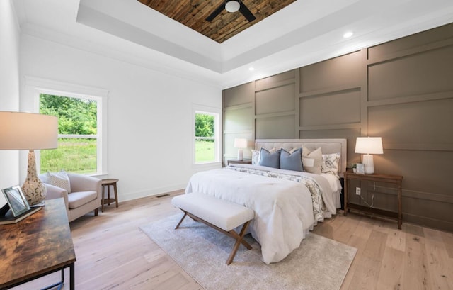 8340 Snowdrop Way, Ooltewah, TN 37363 - bedroom featuring a raised ceiling, multiple windows, wooden ceiling, light wood finished floors, and recessed lighting
