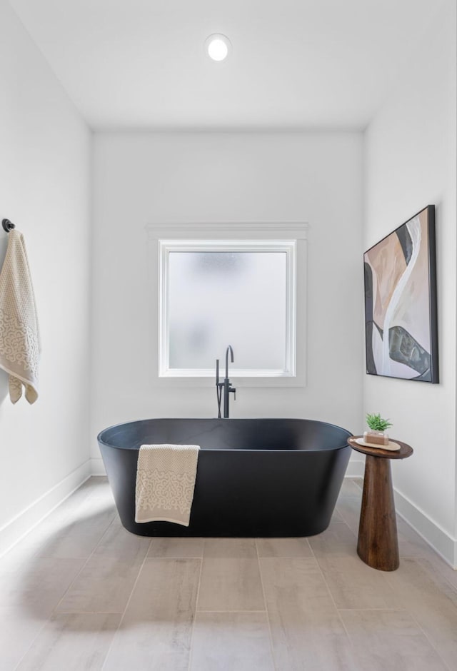 8340 Snowdrop Way, Ooltewah, TN 37363 - full bath with a freestanding tub and recessed lighting