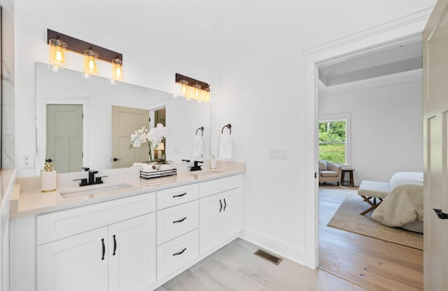 8340 Snowdrop Way, Ooltewah, TN 37363 - ensuite bathroom with double vanity and baseboards