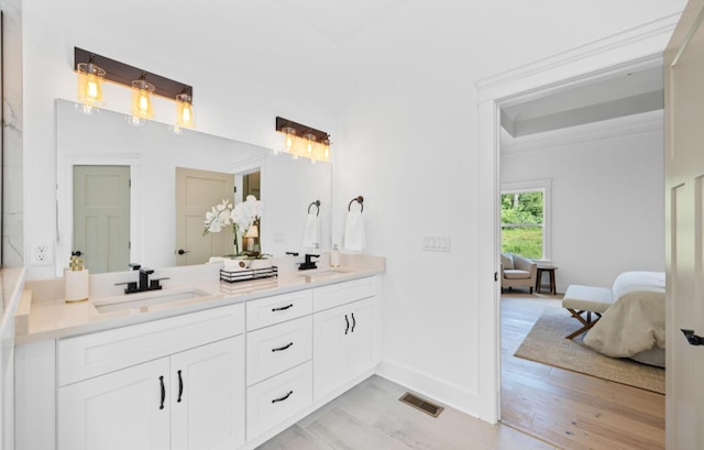 8340 Snowdrop Way, Ooltewah, TN 37363 - ensuite bathroom with double vanity and baseboards