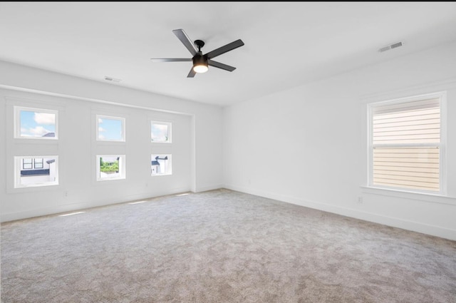 8340 Snowdrop Way, Ooltewah, TN 37363 - spare room with plenty of natural light, carpet flooring, and a ceiling fan