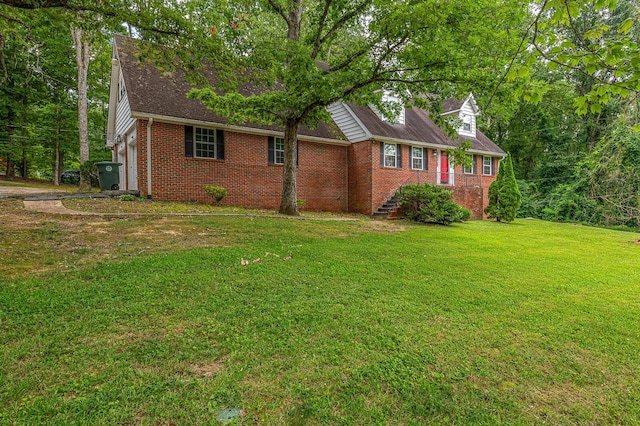 848 Skyline Park Dr, Signal Mountain, TN 37377 - view of front facade with brick siding, a front lawn, and roof with shingles