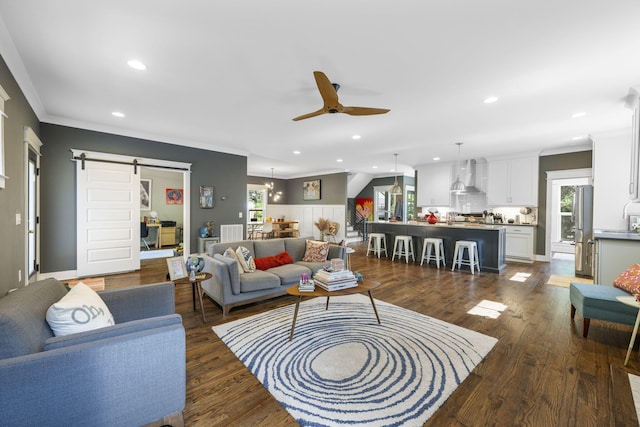 834 Dartmouth St, Chattanooga, TN 37405 - living area featuring a barn door, crown molding, a ceiling fan, recessed lighting, and dark wood-type flooring