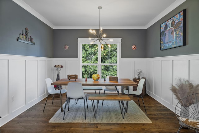834 Dartmouth St, Chattanooga, TN 37405 - dining area with a decorative wall, ornamental molding, a chandelier, wainscoting, and wood finished floors