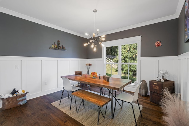 834 Dartmouth St, Chattanooga, TN 37405 - dining room featuring a decorative wall, wainscoting, ornamental molding, a chandelier, and dark wood-type flooring