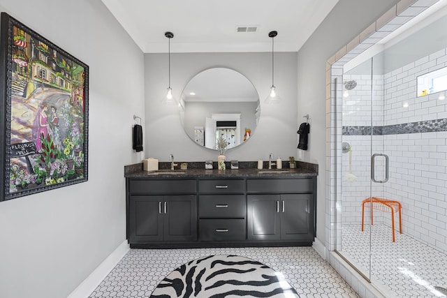 834 Dartmouth St, Chattanooga, TN 37405 - bathroom with double vanity, a stall shower, crown molding, and tile patterned floors