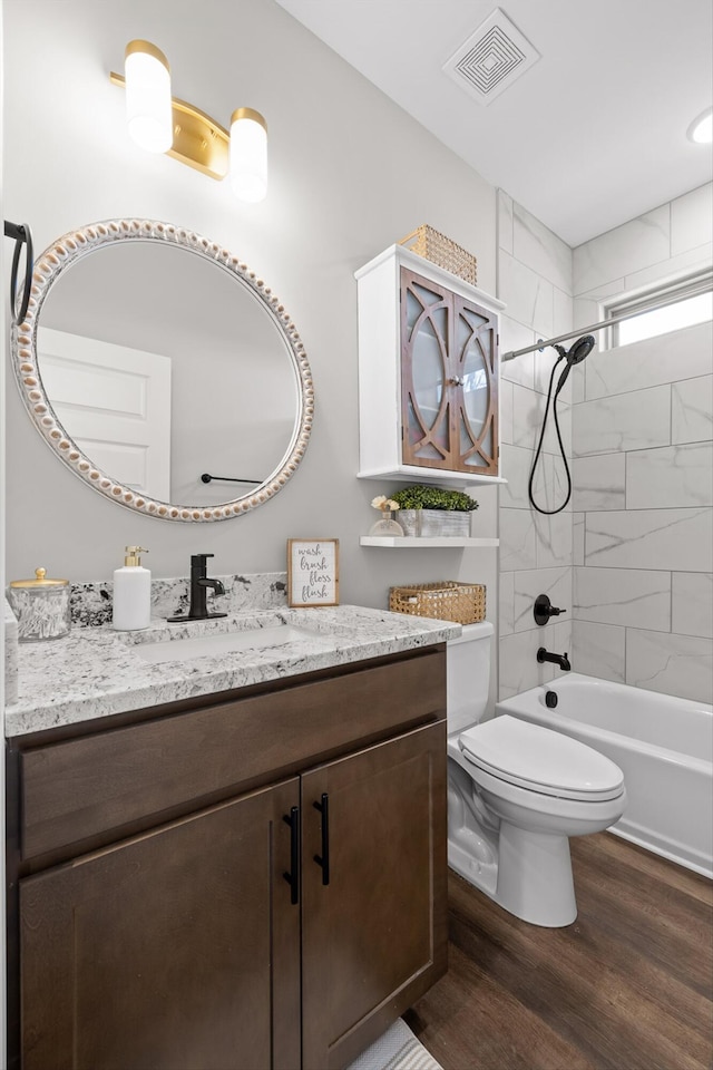596 Nature Trl, Soddy Daisy, TN 37379 - bathroom featuring wood finished floors, vanity, and washtub / shower combination