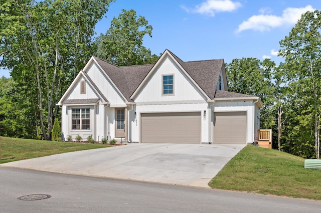 596 Nature Trl, Soddy Daisy, TN 37379 - modern inspired farmhouse featuring driveway, a front yard, a shingled roof, and an attached garage