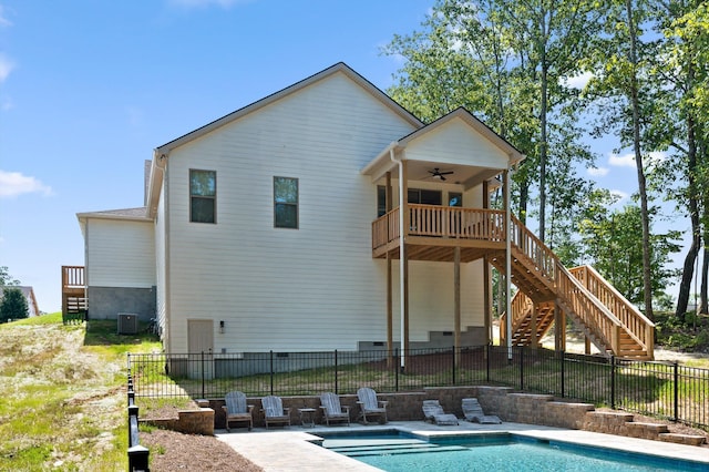 596 Nature Trl, Soddy Daisy, TN 37379 - back of property featuring stairs, a ceiling fan, a fenced backyard, and crawl space