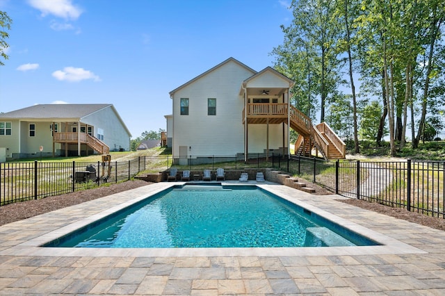 596 Nature Trl, Soddy Daisy, TN 37379 - view of swimming pool featuring stairs, ceiling fan, and a fenced backyard