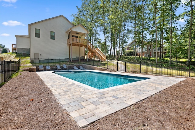 596 Nature Trl, Soddy Daisy, TN 37379 - view of swimming pool with stairs, a ceiling fan, a fenced backyard, and a patio area