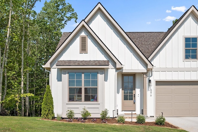 596 Nature Trl, Soddy Daisy, TN 37379 - modern farmhouse style home featuring roof with shingles, board and batten siding, a front yard, and driveway