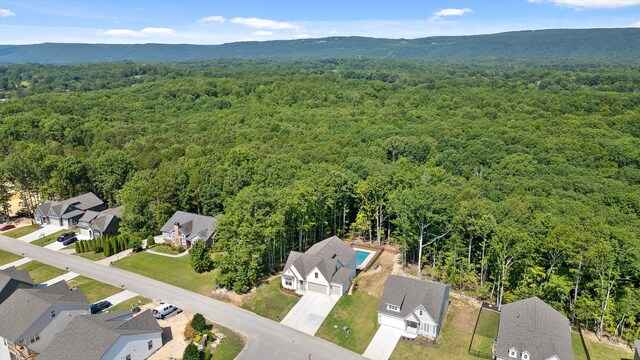 596 Nature Trl, Soddy Daisy, TN 37379 - aerial view of residential area featuring a forest and a mountainous background