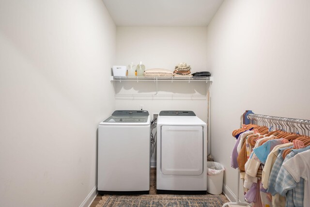 8520 Kensley Ln, Hixson, TN 37343 - laundry area with washing machine and dryer and baseboards