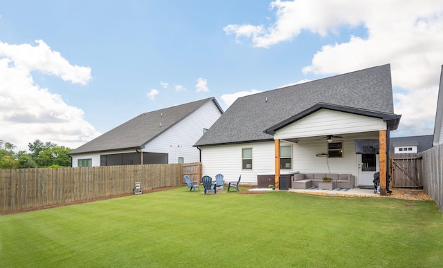 8520 Kensley Ln, Hixson, TN 37343 - back of property featuring ceiling fan, outdoor lounge area, a fenced backyard, a shingled roof, and a patio