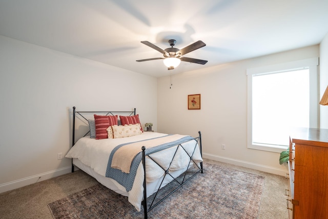 8520 Kensley Ln, Hixson, TN 37343 - carpeted bedroom with baseboards and a ceiling fan