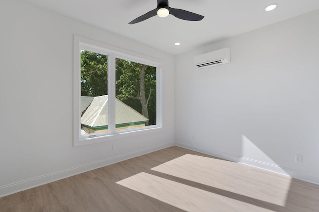 1310 Top St, Chattanooga, TN 37408 - spare room featuring a wall unit AC, wood finished floors, recessed lighting, and a ceiling fan