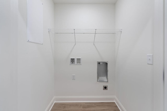 1310 Top St, Chattanooga, TN 37408 - laundry area featuring electric dryer hookup, washer hookup, and wood finished floors