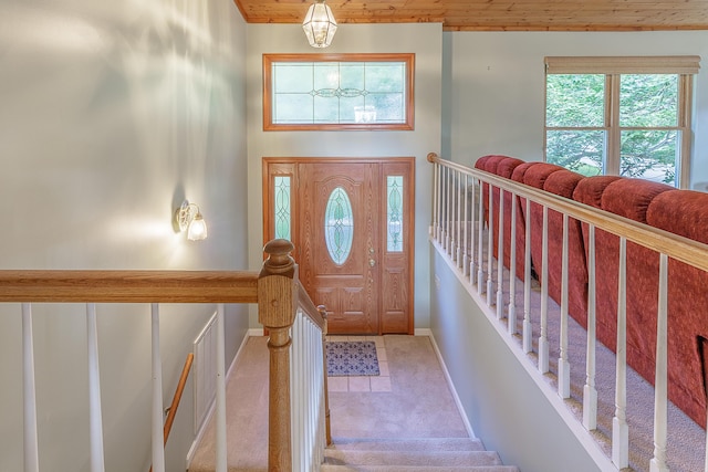 6134 Blue Ash Dr, Ooltewah, TN 37363 - carpeted entrance foyer featuring wooden ceiling and baseboards