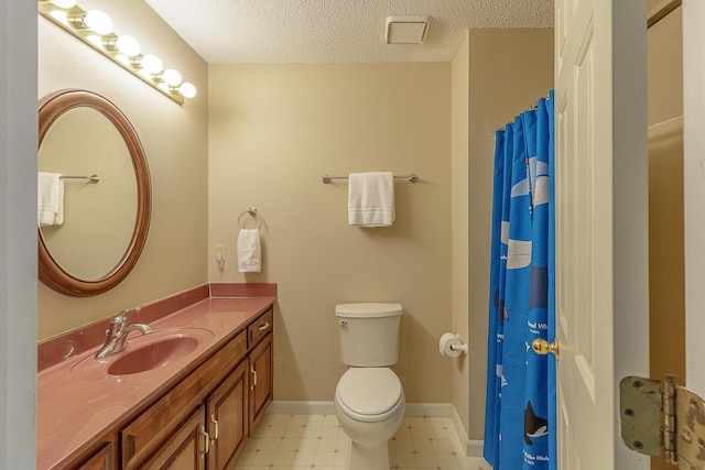 6134 Blue Ash Dr, Ooltewah, TN 37363 - bathroom featuring tile patterned floors, vanity, a textured ceiling, and curtained shower