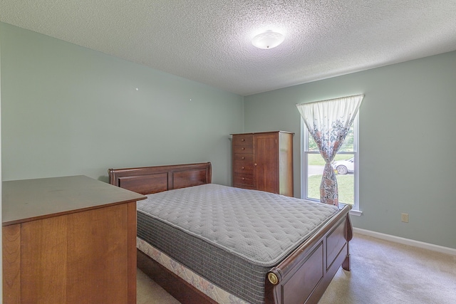 6134 Blue Ash Dr, Ooltewah, TN 37363 - bedroom featuring light carpet and a textured ceiling