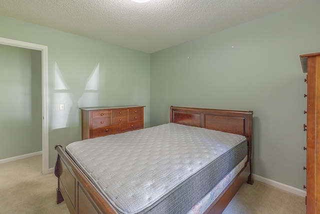 6134 Blue Ash Dr, Ooltewah, TN 37363 - bedroom with light carpet and baseboards