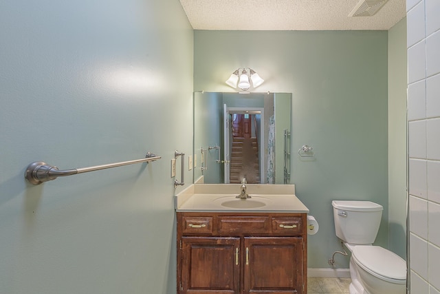 6134 Blue Ash Dr, Ooltewah, TN 37363 - bathroom with vanity and a textured ceiling