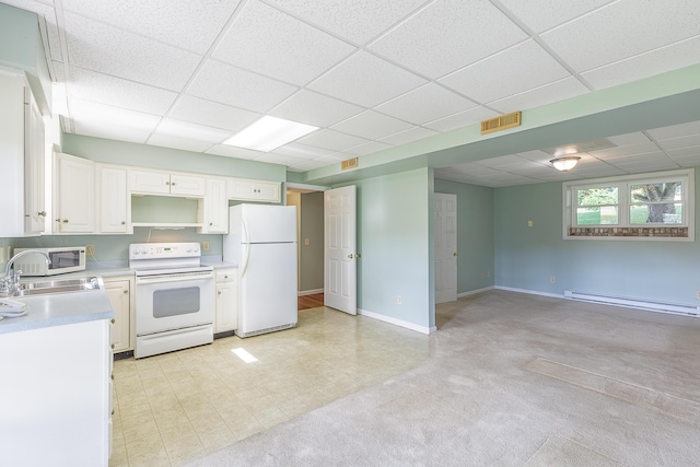 6134 Blue Ash Dr, Ooltewah, TN 37363 - kitchen with white appliances, a baseboard heating unit, a drop ceiling, light countertops, and white cabinetry