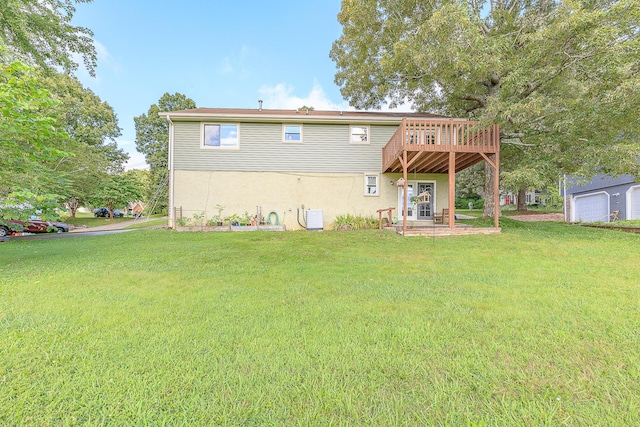 6134 Blue Ash Dr, Ooltewah, TN 37363 - back of property with a lawn, a deck, and stucco siding