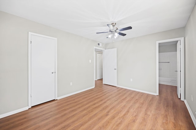 900 Mountain Creek Rd Unit V479, Chattanooga, TN 37405 - unfurnished bedroom with light wood-type flooring, ensuite bathroom, and ceiling fan