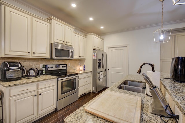 5215 Austin Rd, Hixson, TN 37343 - kitchen with stainless steel appliances, crown molding, backsplash, dark wood-style flooring, and recessed lighting